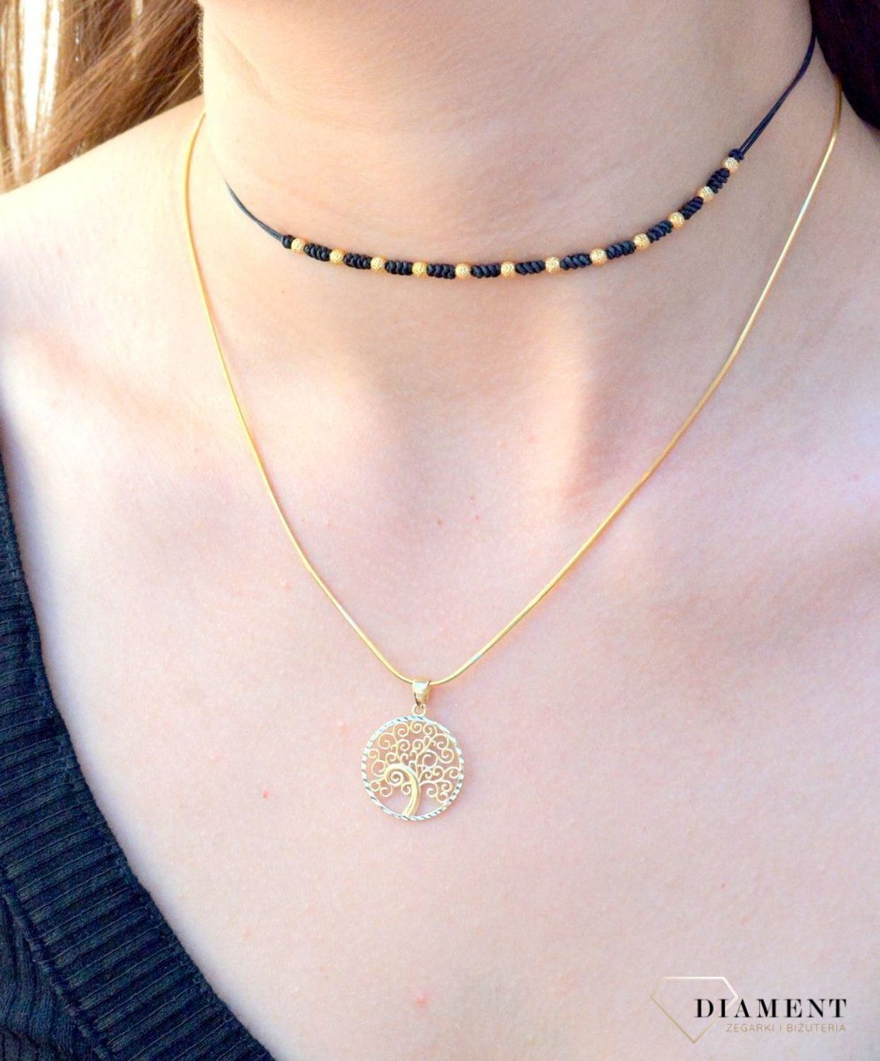 Złota zawieszka 'Drzewko szczęścia z białym złotem' ZA 4653 333. Nowoczesna zawieszka złota zawieszka drzewko szczęścia z białym złotem, w którym znajduje się kształt drzewka, które zostało ozdobione.jpg